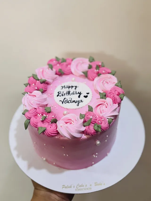 Hand-piped pink floral eggless cake